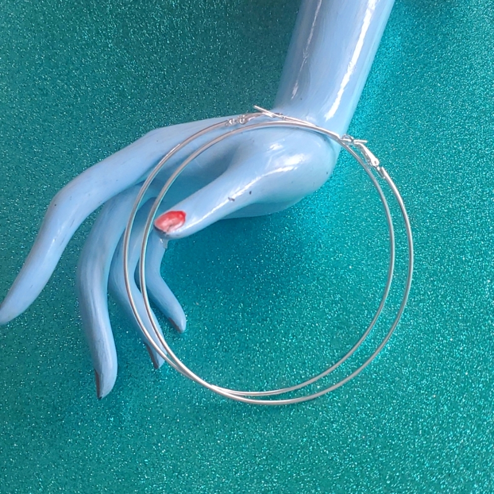 Large silvertone hoop Earrings